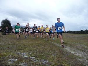 First across the line, Lorenz Kissling, (No 82) leading the field on the Hawea River Track for Race 1 Kathmandu Riverrun Trail Series, Lake Wanaka